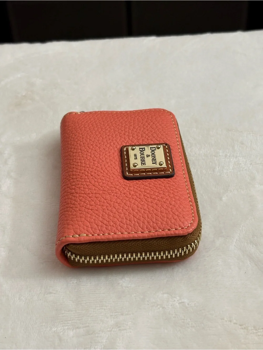 Dooney & Bourke Pebble Grain Large Zip Around Credit Card Case  Coral Color.